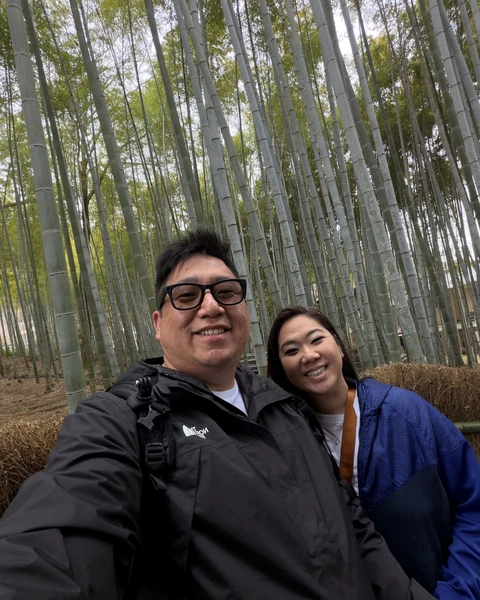 David and his wife visiting the Arashiyama bamboo grove on their Japan honeymoon