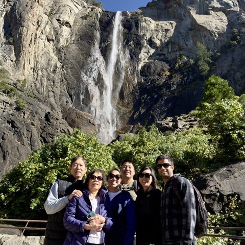 Family standing near Yosemite Falls